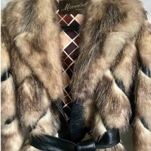 Lucious Mirrow's fox fur, JLo, Kardashian vibe